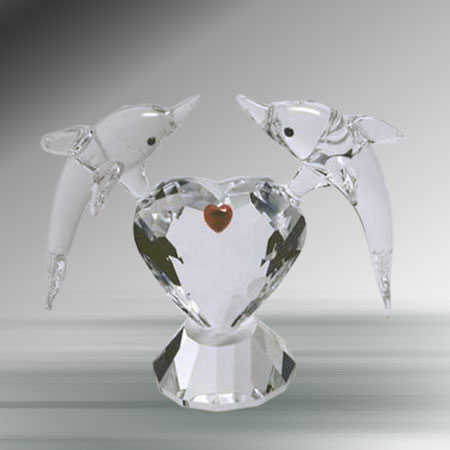 178-crystal-dolphin-figurine-on-heart.jpg