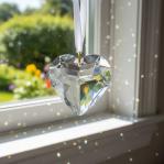 Hanging Puffed Crystal Heart Prism is a full body prism making it thicker than most reflecting an abundance of sparkle